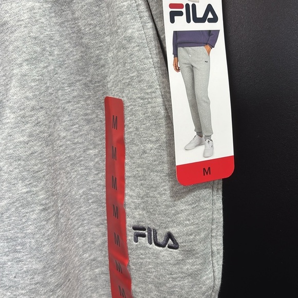 FILA Fleece Lined Joggers, elastic drawcord waist,hip pockets,embroidered logo - Picture 4 of 9